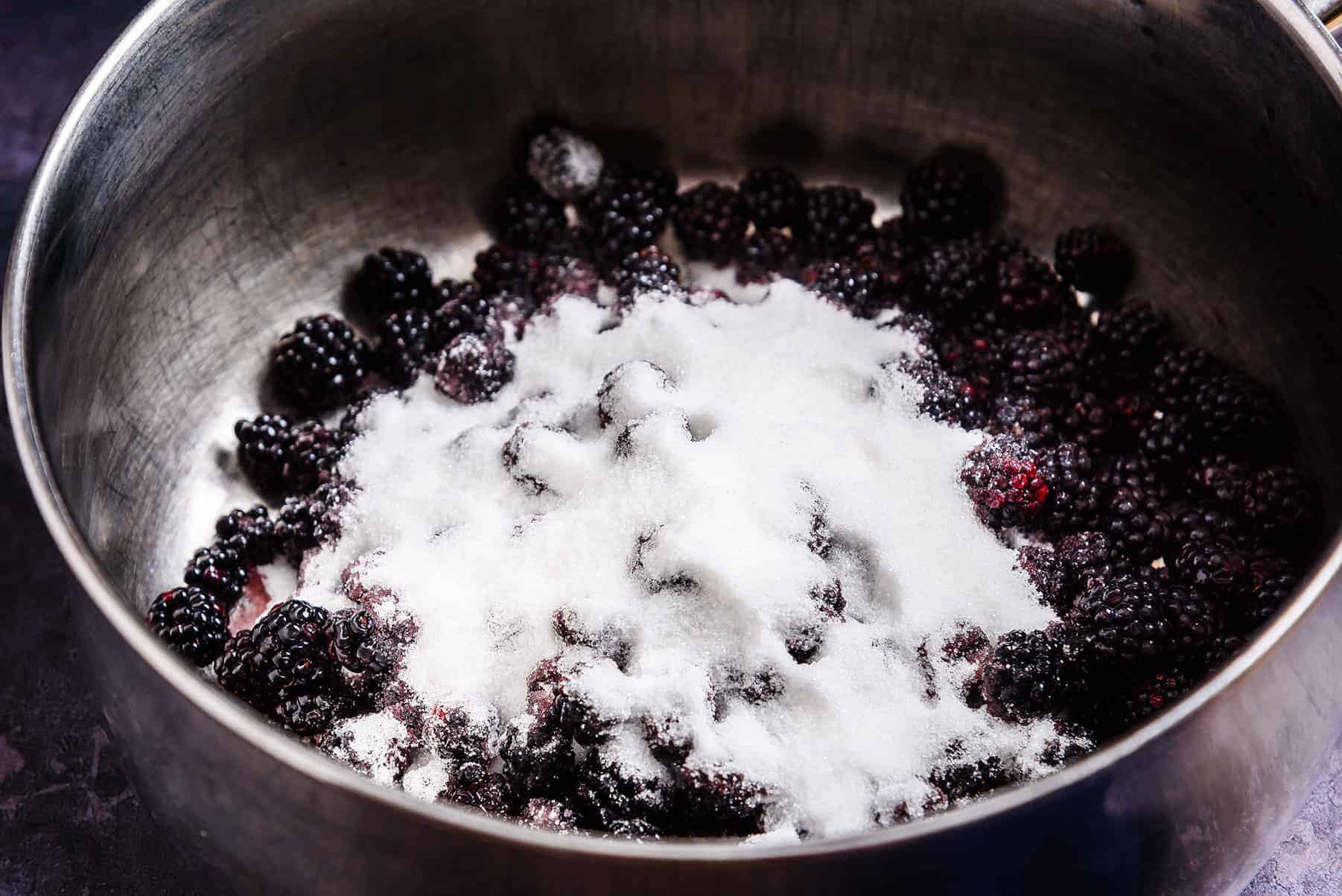 Blackberries and Sugar in a pan