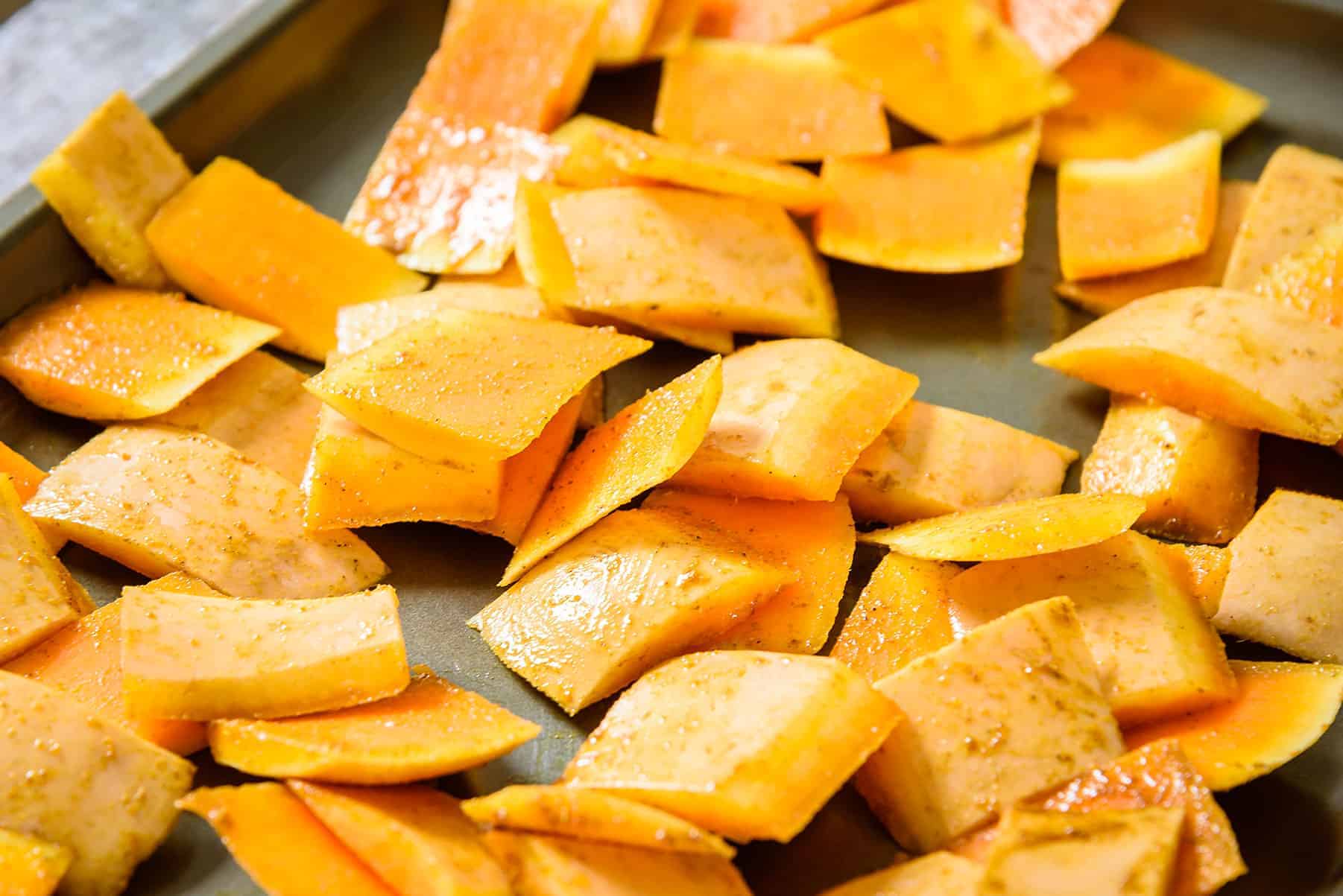 Seasoned Butternut Squash Skin Pieces on oven tray