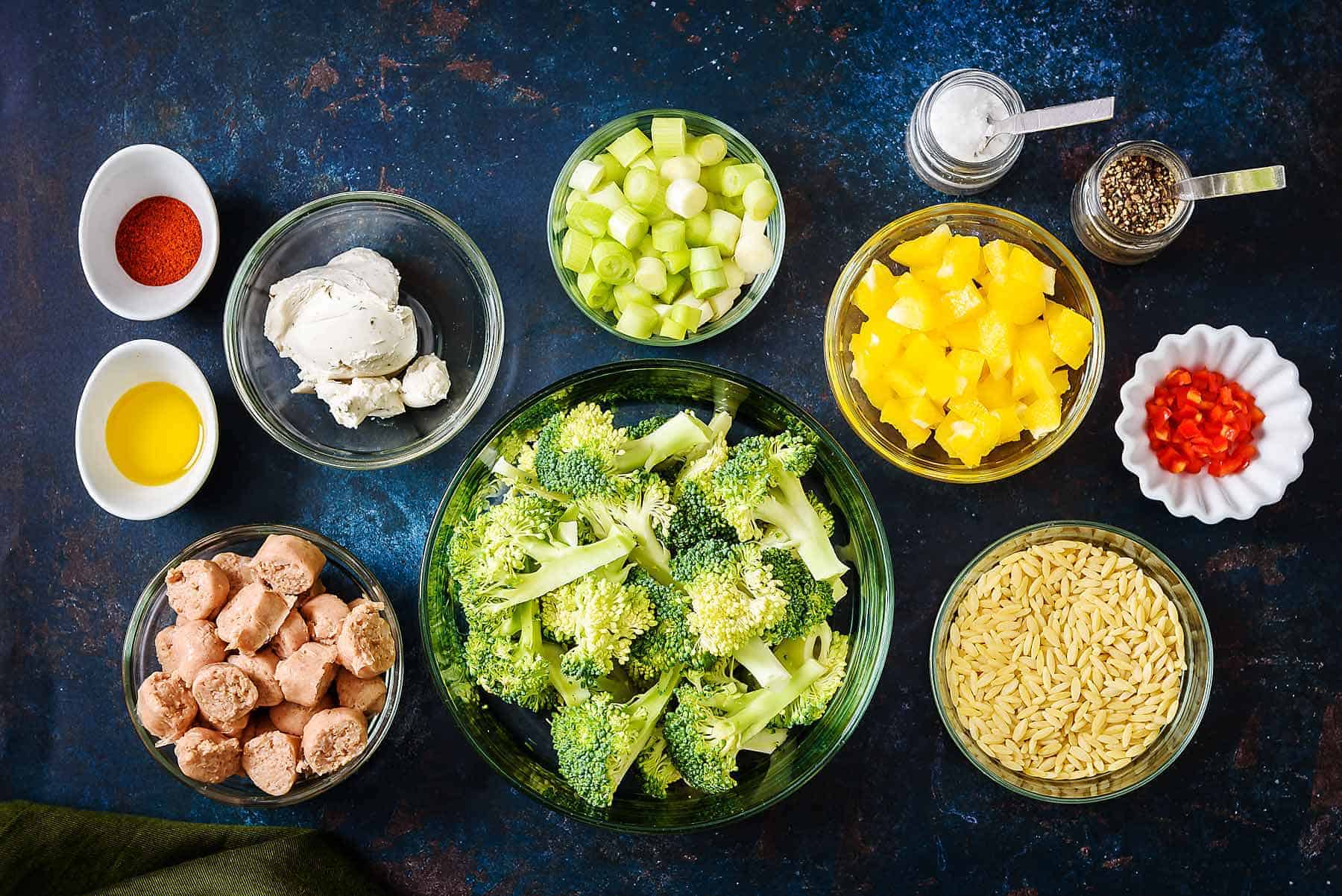 Ingredients for sausage and broccoli one-pan