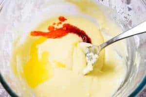Adding colouring and flavouring to vegan orange butter icing