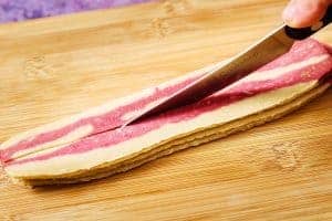 Slicing the vegan bacon into strips