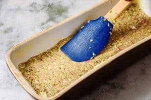 Smoothing top of mixture in a loaf dish