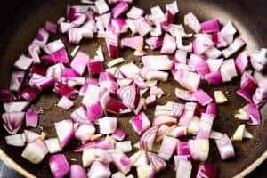 Diced red onions in a pan