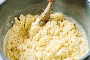 Flour mixed into creamed butter and sugar