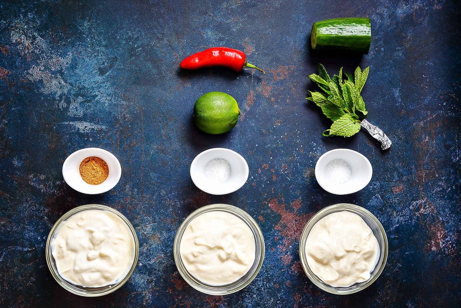 Ingredients for trio of yoghurt dips