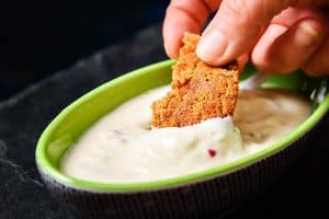 Pattie dipped in Chilli & Lime Dip from Trio of Yoghurt Dips