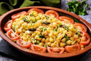 Warm Asparagus & Pasta Salad in a serving dish